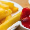 French fries with ketchup and mayonnaise sauces