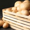 Raw,Fresh,Organic,Potatoes,On,Wooden,Table